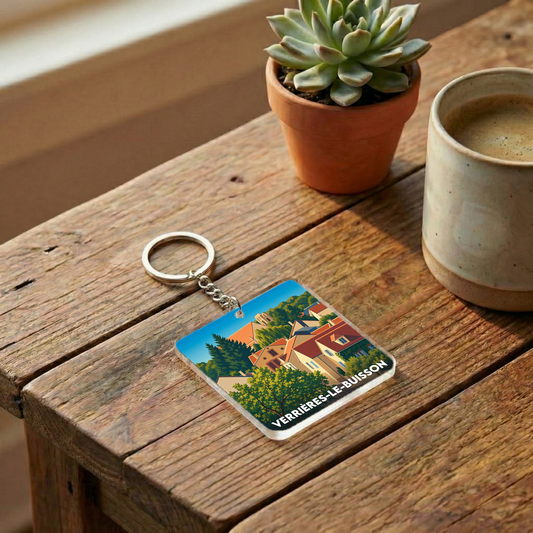 Porte-clés souvenir de la ville de Verrières-le-Buisson avec une illustration stylisée de ses maisons.