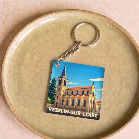 Porte-clés souvenir de la ville de Vézelin-sur-Loire avec une illustration stylisée de son église.