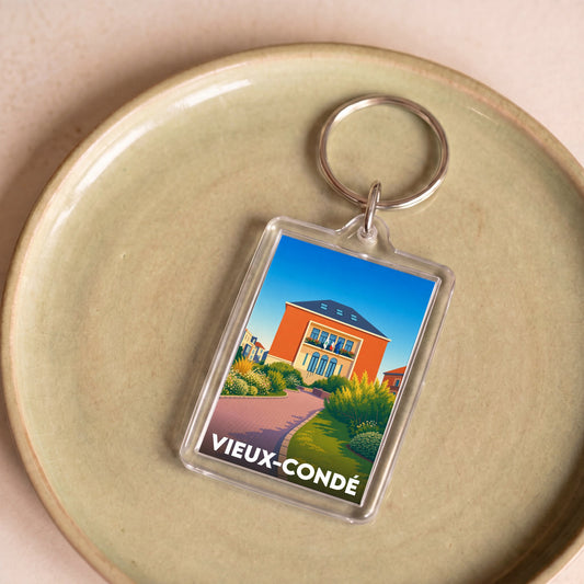 Porte-clés souvenir de la ville de Vieux-Condé avec une illustration stylisée.