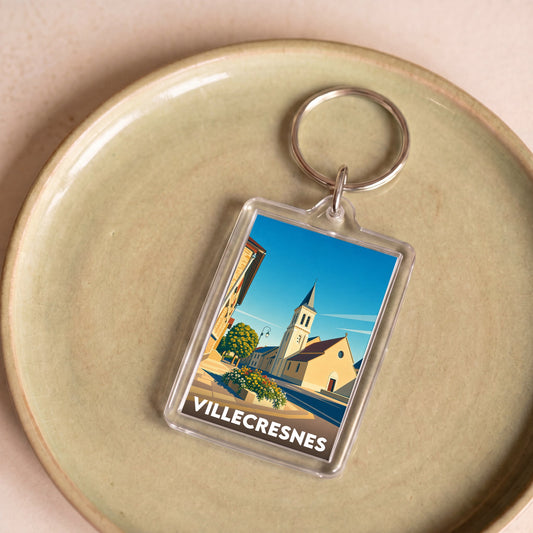 Porte-clés souvenir de la ville de Villecresnes avec une illustration stylisée.