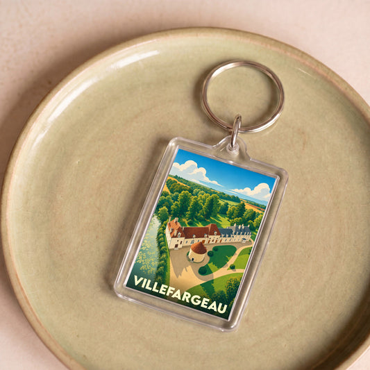 Porte-clés souvenir de la ville de Villefargeau avec une illustration stylisée.