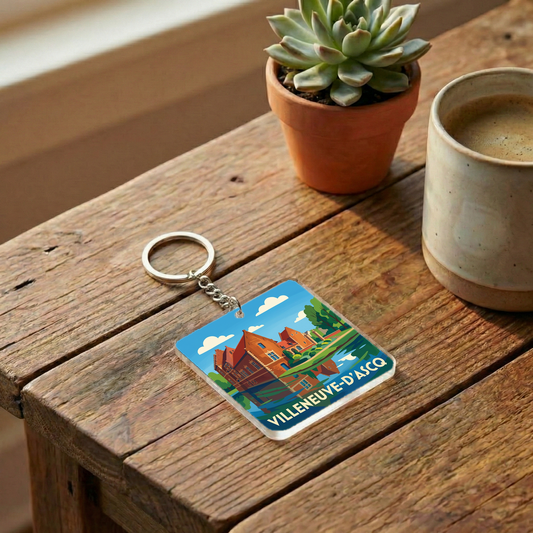Porte-clés souvenir de la ville de Villeneuve-d'Ascq avec une illustration stylisée.