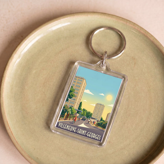 Porte-clés souvenir de la ville de Villeneuve-Saint-Georges avec une illustration stylisée.