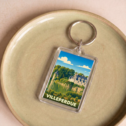 Porte-clés souvenir de la ville de Villeperdue avec une illustration stylisée d'un château au bord de l'eau.