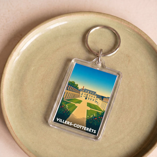 Porte-clés souvenir de la ville de Villers-Cotterêts avec une illustration stylisée de son château.