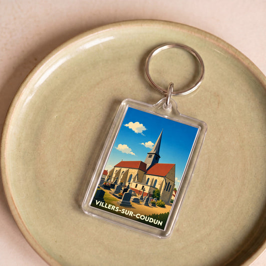 Porte-clés souvenir de la ville de Villers-sur-Coudun avec une illustration stylisée de son église.