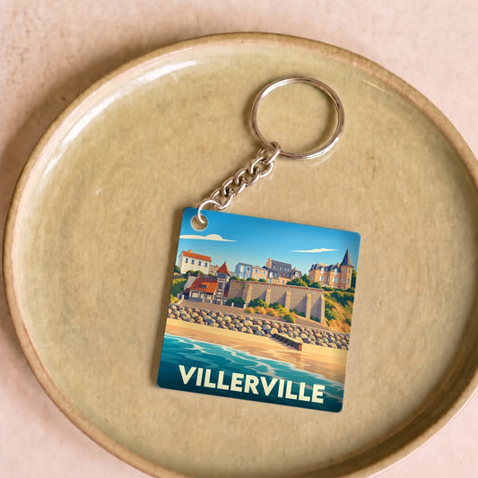 Porte-clés souvenir de la ville de Villerville avec une illustration stylisée du front de mer.