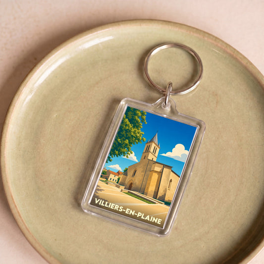 Porte-clés souvenir de la ville de Villiers-en-Plaine avec une illustration stylisée de son église.