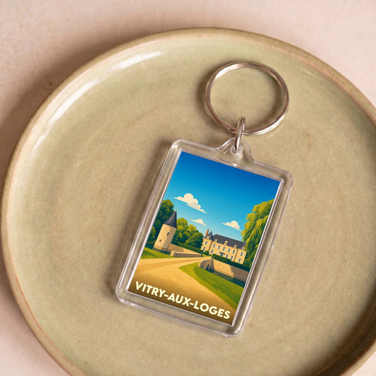 Porte-clés souvenir de la ville de Vitry-aux-Loges avec une illustration stylisée de son château.