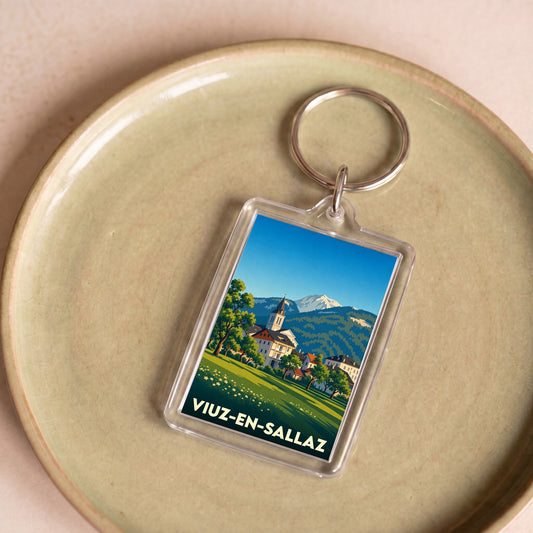 Porte-clés souvenir de la ville de Viuz-en-Sallaz avec une illustration stylisée.