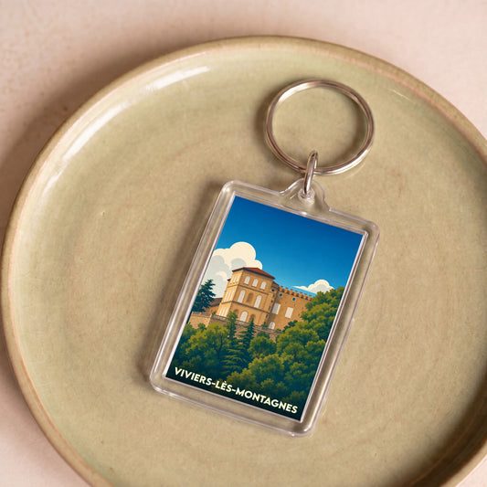Porte-clés souvenir de la ville de Viviers-lès-Montagnes avec une illustration stylisée.