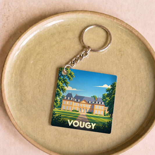 Porte-clés souvenir de la ville de Vougy avec une illustration stylisée de son château.