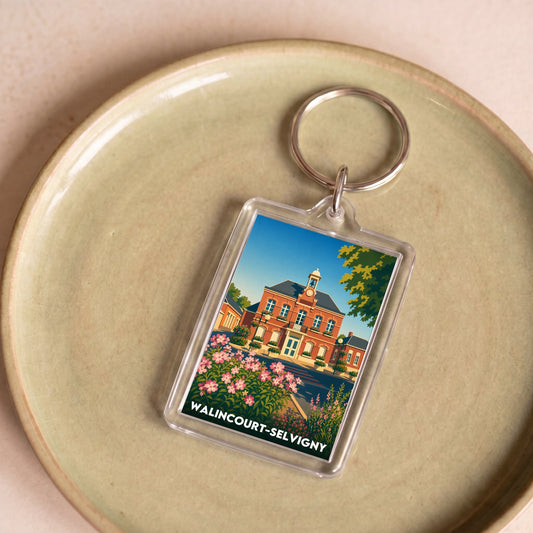 Porte-clés souvenir de la ville de Walincourt-Selvigny avec une illustration stylisée.