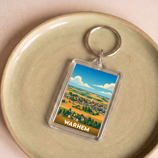 Porte-clés souvenir de la ville de Warhem avec une illustration stylisée.
