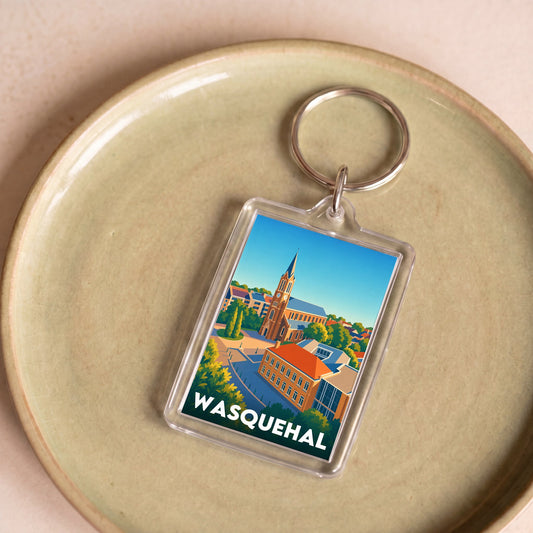 Porte-clés souvenir de la ville de Wasquehal avec une illustration stylisée.