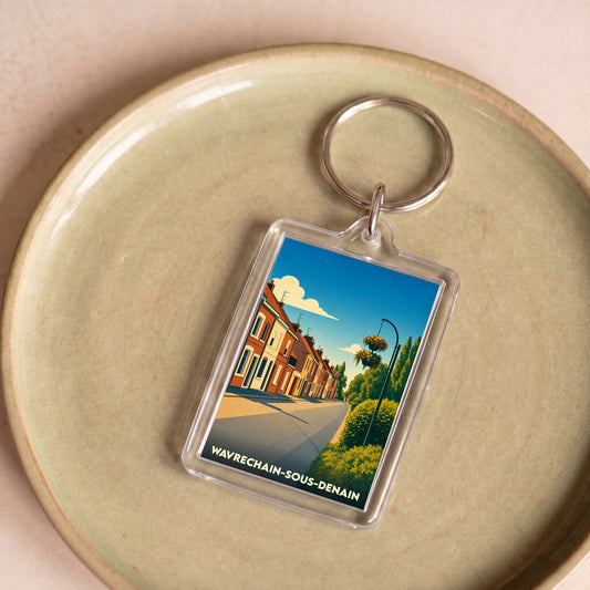 Porte-clés souvenir de la ville de Wavrechain-sous-Denain avec une illustration stylisée.