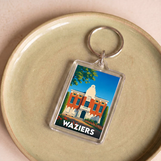 Porte-clés souvenir de la ville de Waziers avec une illustration stylisée de son hôtel de ville.