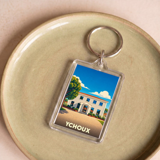 Porte-clés souvenir de la ville d'Ychoux avec une illustration stylisée de sa mairie.