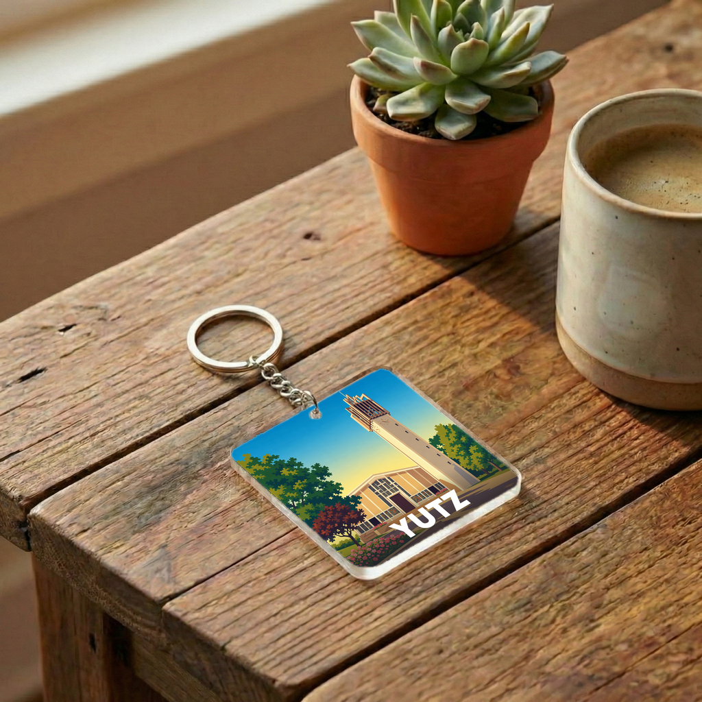 Porte-clés souvenir de la ville de Yutz avec une illustration stylisée de son architecture.