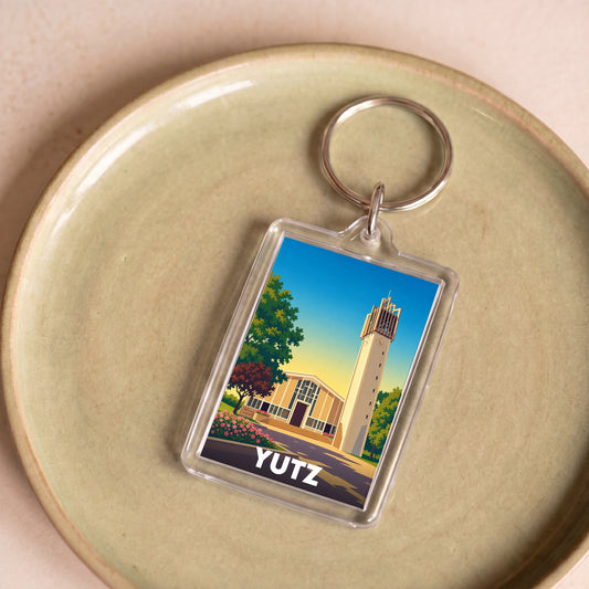 Porte-clés souvenir de la ville de Yutz avec une illustration stylisée de son architecture.