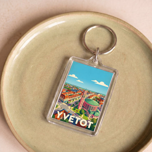 Porte-clés souvenir de la ville d'Yvetot avec une illustration stylisée.