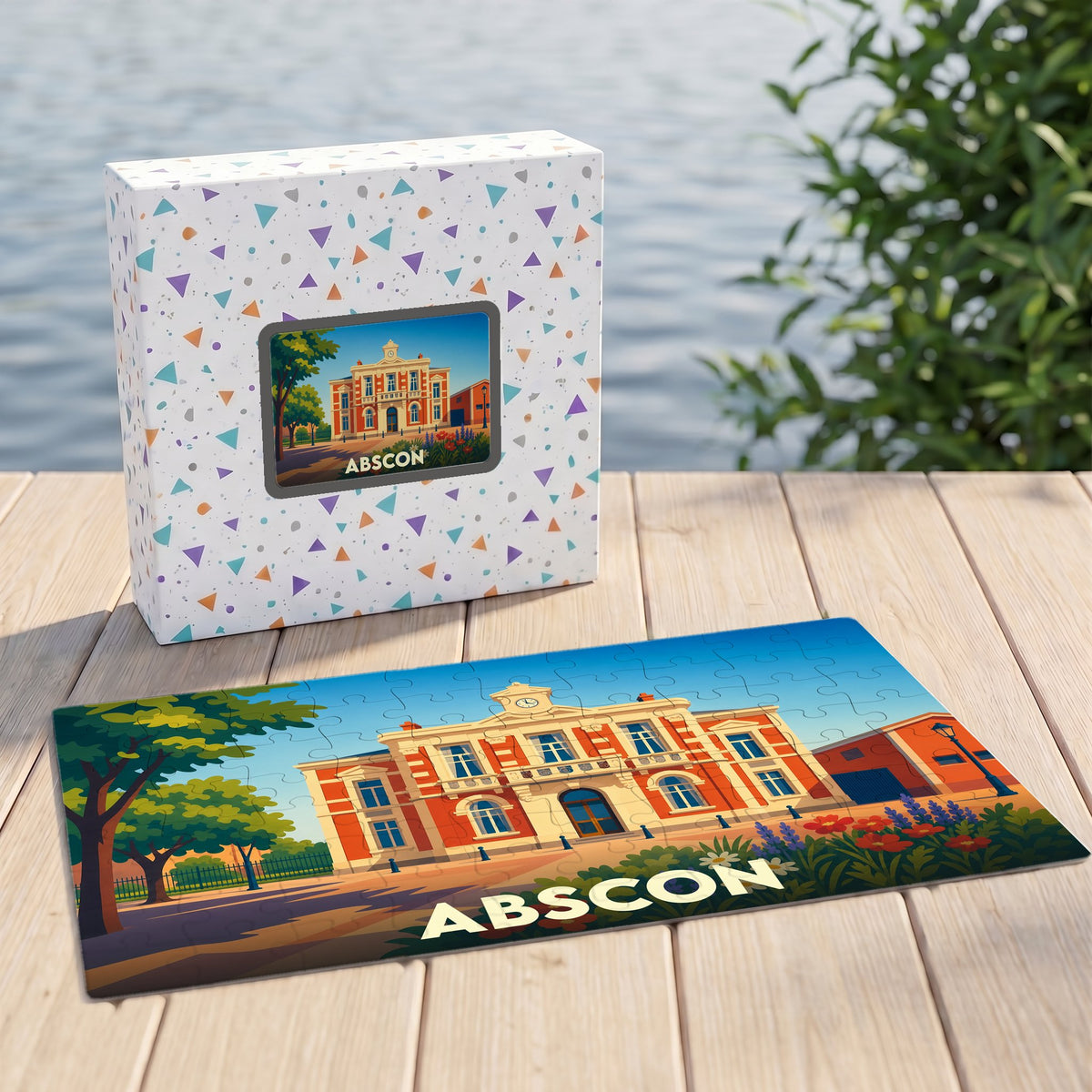 Puzzle souvenir de la ville d'Abscon avec une illustration stylisée d'un bâtiment historique.