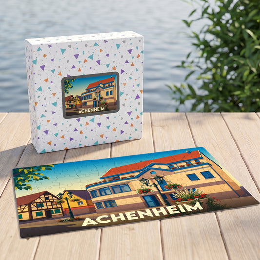 Puzzle souvenir de la ville d'Achenheim avec une illustration stylisée et colorée de ses maisons typiques.