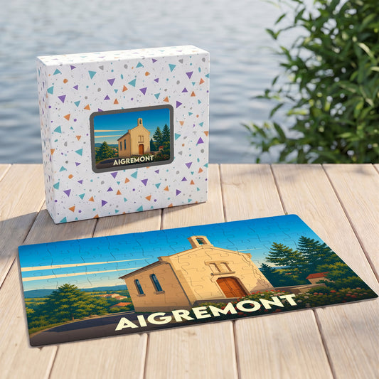 Puzzle souvenir de la ville d'Aigremont avec une illustration stylisée d'une chapelle.