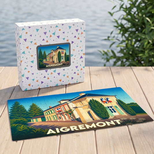 Puzzle souvenir de la ville d'Aigremont avec une illustration stylisée d'un bâtiment arborant des drapeaux français.