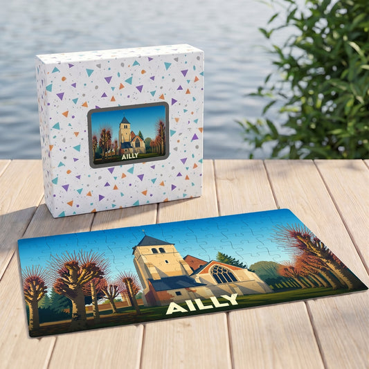 Puzzle souvenir de la ville d'Ailly avec une illustration stylisée d'une église et de son parc.