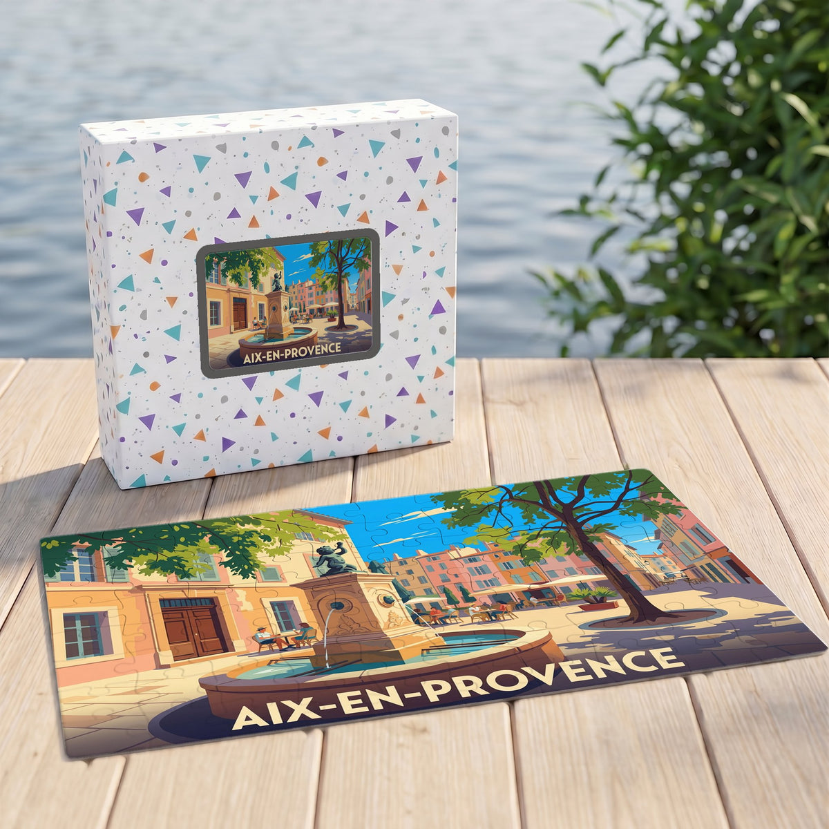 Puzzle souvenir de la ville d'Aix-en-Provence avec une illustration colorée d'une place et sa fontaine.