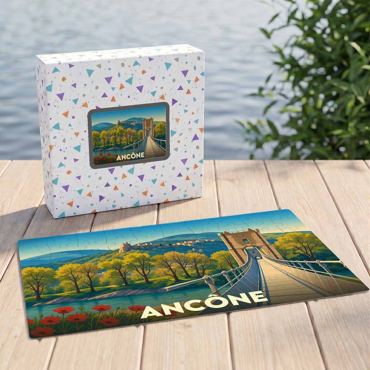 Puzzle souvenir de la ville d'Ancône illustrant un pont suspendu dans un paysage coloré.