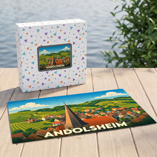 Puzzle souvenir de la ville d'Andolsheim avec une illustration stylisée de son paysage et de son église.