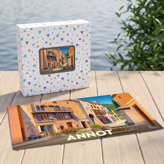 Puzzle souvenir de la ville d'Annot avec une illustration stylisée d'une rue pittoresque.