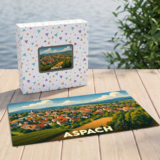 Puzzle souvenir de la ville d'Aspach avec une illustration panoramique stylisée.