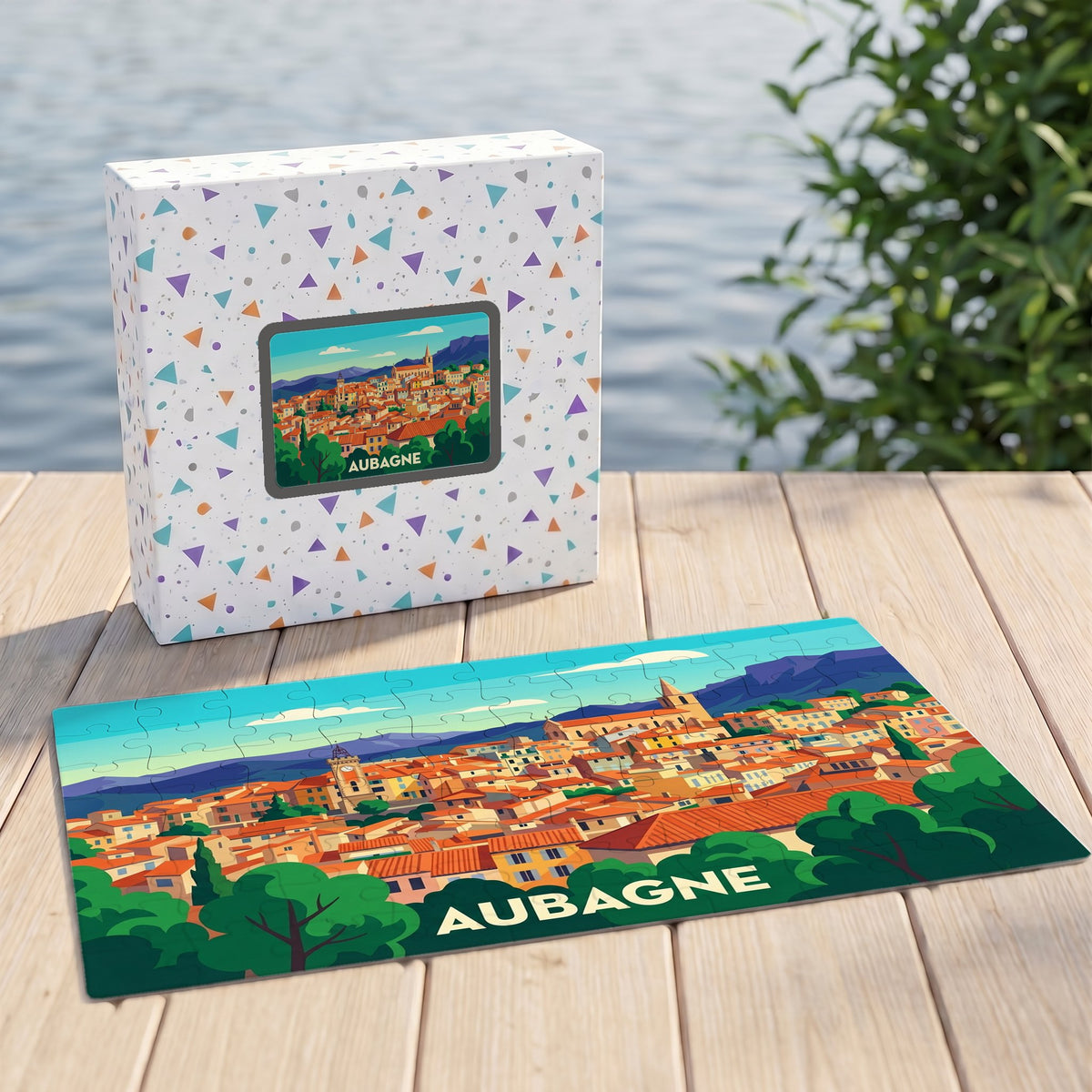 Puzzle souvenir de la ville d'Aubagne avec une illustration panoramique colorée et stylisée.