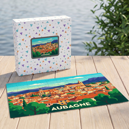 Puzzle souvenir de la ville d'Aubagne avec une illustration panoramique colorée et stylisée.