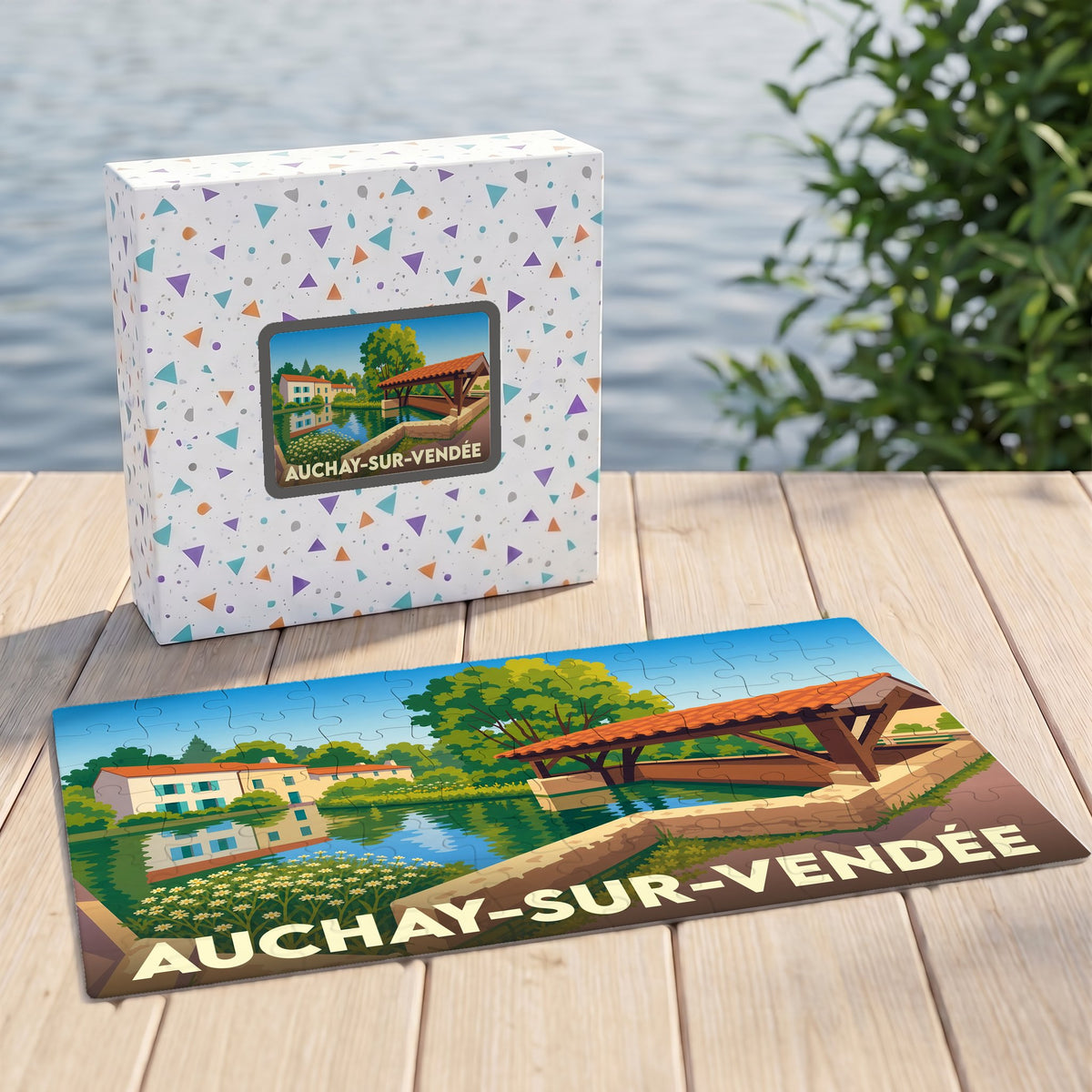 Puzzle souvenir de la ville de Auchay-sur-Vendée avec une illustration stylisée et colorée.