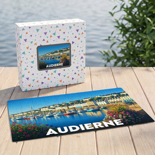 Puzzle souvenir de la ville d'Audierne illustrant son port de plaisance avec un lettrage blanc.