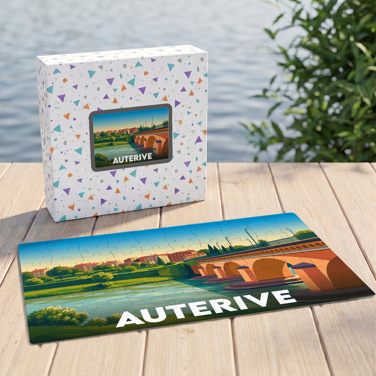 Puzzle souvenir de la ville d'Auterive avec une illustration stylisée de son pont et de ses quais.
