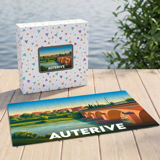 Puzzle souvenir de la ville d'Auterive avec une illustration stylisée de son pont et de ses quais.