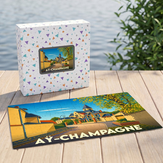 Puzzle souvenir de la ville de Aÿ-Champagne avec une illustration stylisée d'un paysage urbain.