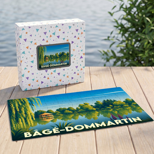 Puzzle souvenir de la ville de Bâgé-Dommartin avec une illustration stylisée d'un paysage lacustre.