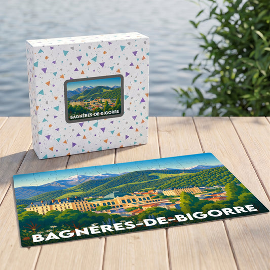 Puzzle souvenir de la ville de Bagnères-de-Bigorre présentant une illustration panoramique de la ville au pied des montagnes.