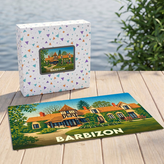Puzzle souvenir de la ville de Barbizon avec une illustration stylisée d'une maison de campagne.