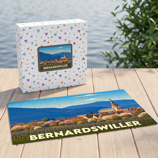 Puzzle souvenir de la ville de Bernardswiller avec une illustration stylisée d'un paysage alsacien.