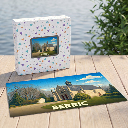 Puzzle souvenir de la ville de Berric représentant une église sous un ciel bleu.