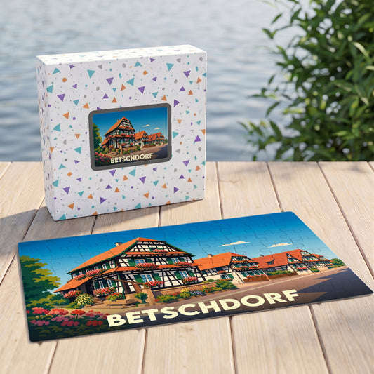 Puzzle souvenir de la ville de Betschdorf avec une illustration stylisée de maisons à colombages.