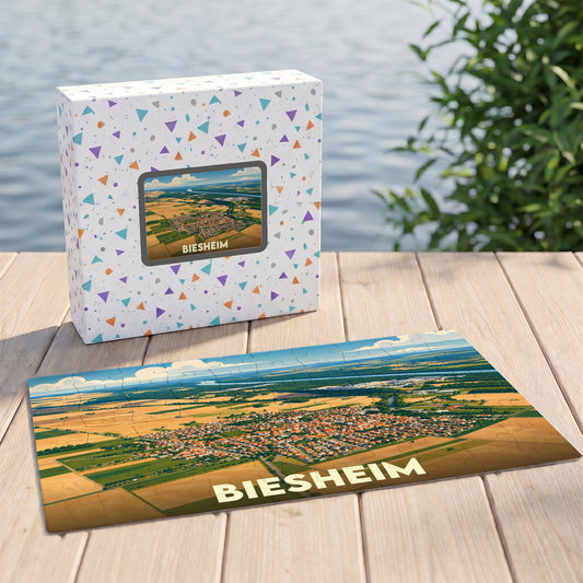 Puzzle souvenir de la ville de Biesheim avec une illustration aérienne colorée.