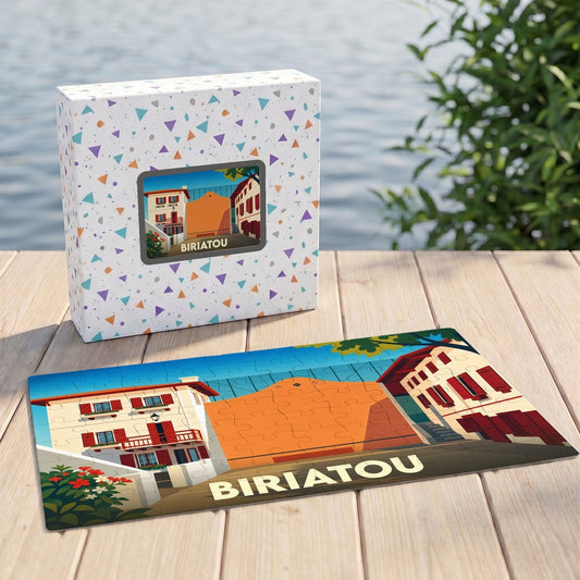 Puzzle souvenir de la ville de Biriatou avec une illustration stylisée et sa boîte assortie.